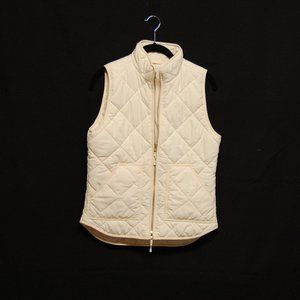 J. Crew cream quilted puffer vest.